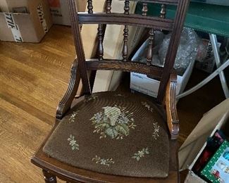 Antique chair with needlepoint cushion seat. 