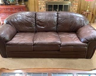 Leather sofa - matching oversized chair and ottoman in another photo