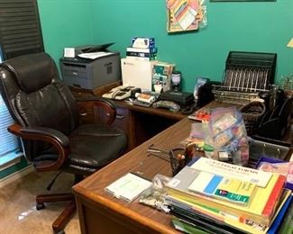 Desk with return, desk chair, printer, office supplies, slide rules