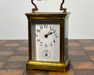 DUVERDREY & BLOQUEL CARRIAGE CLOCK  |  French carriage clock of small size with a brass case, 2 adjustments, the back plate with engraved lion mark - l. 3 x w. 2.5 x h. 5.5 in.