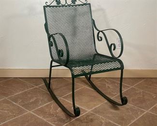 OUTDOOR ROCKING CHAIR  |  Woodard-style, green painted metal with scrolled arms and leaf crest - l. 31 x w. 19 x h. 34-1/4 in.
