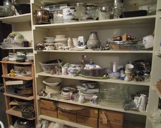 Tons and tons of kitchenware and china all throughout the house