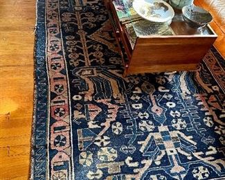 Just one of the MANY antique area rugs.