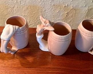 Set of Dorothy Kindell strip tease mugs.