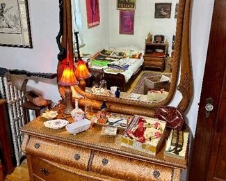 Gorgeous antique quarter sewn oak dresser with mirror.
