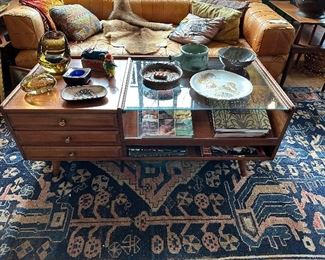 Beautiful Mid Century WIllitt Cherry coffee table with splayed legs, 3 dovetailed drawers and slanted glass top for display and shelf.
