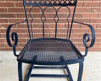 Antique cast iron porch rocker