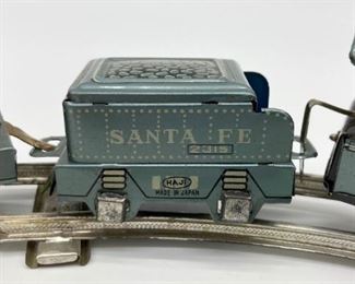 Vintage HAJI train - 6 pieces of track and four train cars