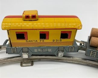 Vintage HAJI train - 6 pieces of track and four train cars