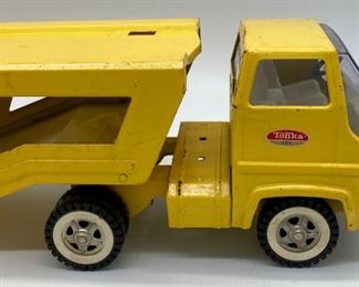 Vintage Tonka car carrier with two cars