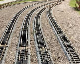 Assorted HO scale model train layout track and accessories