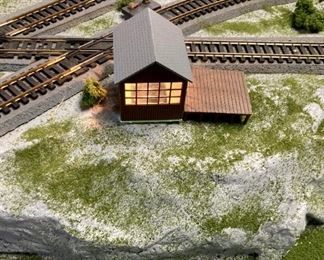 Assorted HO scale model train layout track and accessories