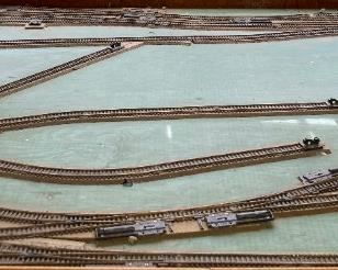 Assorted HO scale model train layout track and accessories