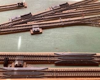 Assorted HO scale model train layout track and accessories