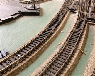 Assorted HO scale model train layout track and accessories
