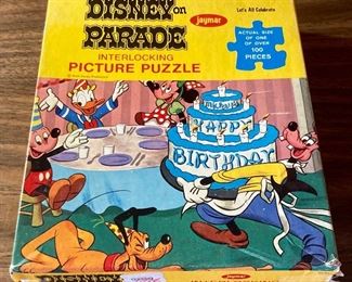 Vintage Disney Parade Interlocking Picture Puzzle featuring Mickey Mose, Minnie Mouse, Donald, Goofy and Pluto