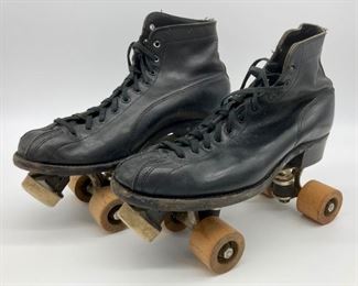 Vintage adult black leather wooden wheel roller skates
