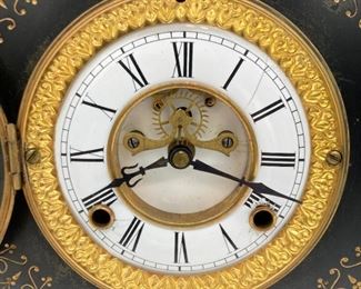 Antique cast iron mantel clock