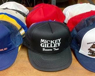 Assortment of hats including straw hats, snap backs, fitted, engineer caps, NCAA and Professional sports, and more