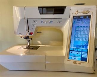 Baby Lock Ellagéa ESG with multiple accessories