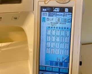 Baby Lock Ellagéa ESG with multiple accessories