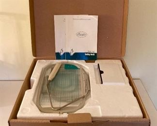 Baby Lock Ellagéa ESG with multiple accessories