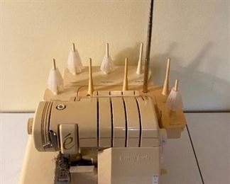 Baby Lock Evolve Serger Model BLE8 and accessories