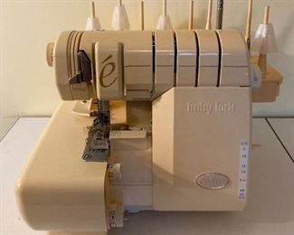 Baby Lock Evolve Serger Model BLE8 and accessories