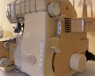 Baby Lock Evolve Serger Model BLE8 and accessories