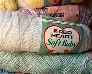 Yarn skeins including yarn by: Red Heart, Lion Brand, Caron, Impeccable by Loops and Threads, Simply Soft by Caron, Bernat, Studio Classic by Nicole, Lily Sugar 'N Cream