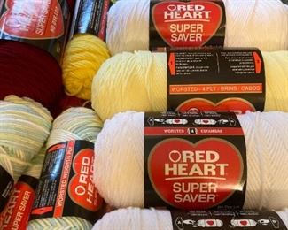 Yarn skeins including yarn by: Red Heart, Lion Brand, Caron, Impeccable by Loops and Threads, Simply Soft by Caron, Bernat, Studio Classic by Nicole, Lily Sugar 'N Cream