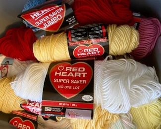 Yarn skeins including yarn by: Red Heart, Lion Brand, Caron, Impeccable by Loops and Threads, Simply Soft by Caron, Bernat, Studio Classic by Nicole, Lily Sugar 'N Cream