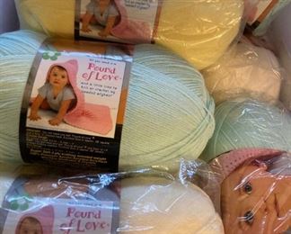 Yarn skeins including yarn by: Red Heart, Lion Brand, Caron, Impeccable by Loops and Threads, Simply Soft by Caron, Bernat, Studio Classic by Nicole, Lily Sugar 'N Cream