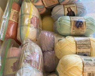 Yarn skeins including yarn by: Red Heart, Lion Brand, Caron, Impeccable by Loops and Threads, Simply Soft by Caron, Bernat, Studio Classic by Nicole, Lily Sugar 'N Cream