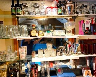 Full bar set-up: swizzle stick collection, tumblers, rocks, beer, shot, tools