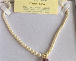 Donation by Antiquarian Traders - 7ct pear shaped Amethyst on pearl enhancer, bail allows to wear on omega chain or regular chain. 