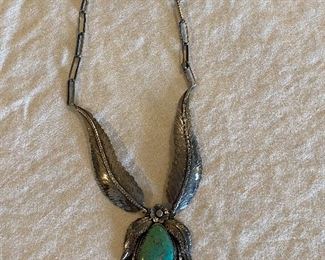 Navajo Sterling turquoise necklace about 17"around neck, signed J. Feather design.