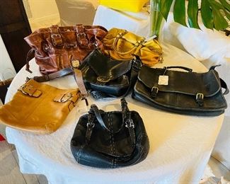 Assortment of Vintage Coach and Dooney Burke purses, leather. 