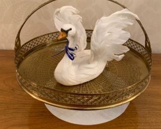 Feather swan on brass pedestal basket