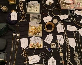 Assorted costume jewelry including some 14K and 10K gold pieces.