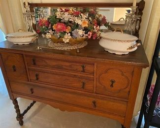 Antique sideboard with beveled mirror.  