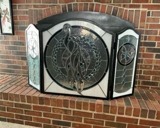 One of a kind stain glass fire place screen.  Handmade