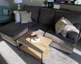 Upholstered (gray) sectional couch in excellent condition.