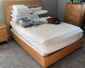 Horizon maple queen-size bed with mattress and box spring in excellent condition.