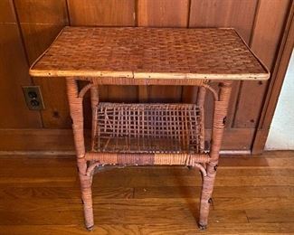 Wicker - Rattan side table and magazine rack. Measures 14” x 23” x 24” tall. Has some minor issues with weaving on bottom rack. Asking $65. 