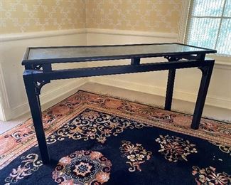 Black Lacquer Asian Chinoiserie Console Table with glass top.  Measures 18” x 50” x 26” tall. Overall very good condition - could use a leg tightened. Asking $250. 