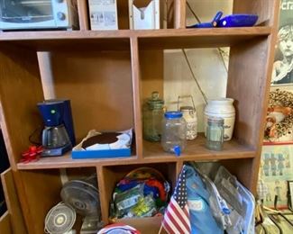 Coffee pot, toaster oven, housewares and party decorations.