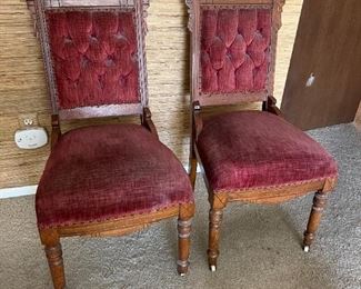 Pair Eastlake side chairs on casters