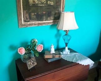 Mahogany drop leaf table $300
Aqua glass lamp $250
Crystal bowl $200