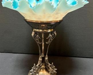 Antique Lovely Silver Plate Center Piece with Floral Painted Bowl. Lovely and intricately detailed. The silver plate pedestal stand by Meriden B. Company holds the ruffled edge bowl painted in a lovely aqua and gold design. Measures 12" h